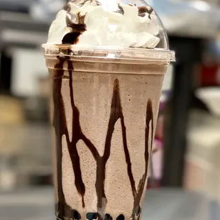 a chocolate slush in a plastic cup