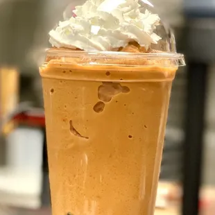 Thai tea slush/frappe with boba and whipped cream!