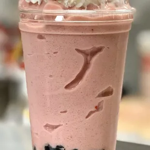 Strawberry banana smoothie with boba and whipped cream!