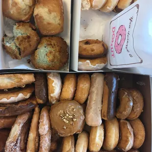 Clockwise from top: banana bread; blueberry muffin(s); and various delicious donuts.