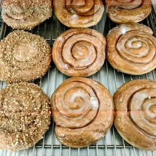 a variety of doughnuts in a display case