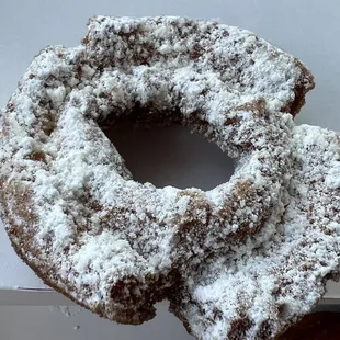 a donut covered in powdered sugar