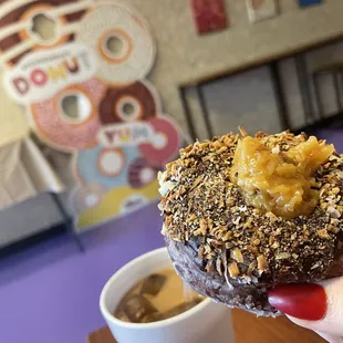 German chocolate cake donut with ice coffee