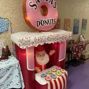 The owner lucked out finding this Santa' Donuts blow up.