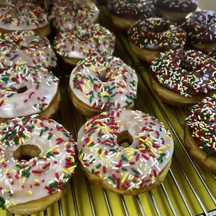 Sprinkle raised donuts