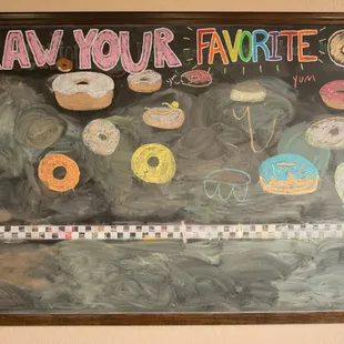 Cute chalk board you can draw donuts on.