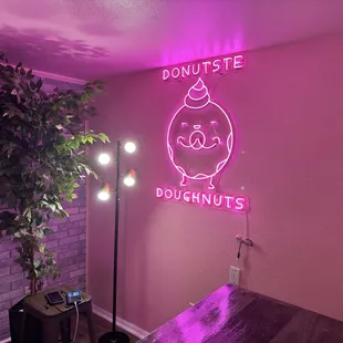 a pink neon sign