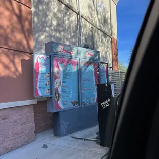 the outside of a donut shop