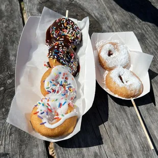 Vanilla sprinkles, chocolate sprinkles, funnel Cake donuts