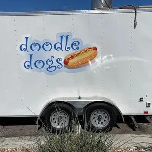 a hot dog on a trailer