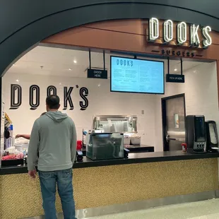 a man standing in front of the counter