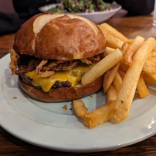 a burger and fries on a plate