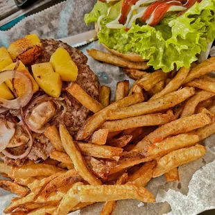 a burger and french fries on a tray
