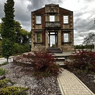 Door to nowhere with some ominous clouds in the background