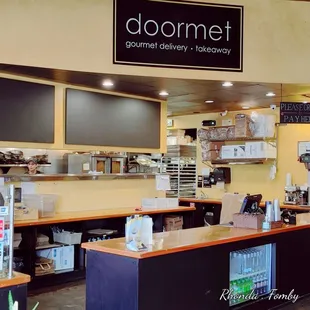 a view of the counter area of a restaurant