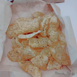 a basket of crispy potato chips