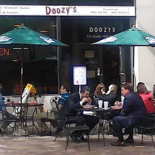 a group of people eating outside
