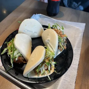 Right/Bottom: Pork belly Bao Bun Left: Lemongrass chicken Bao Bun