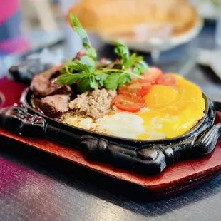 Sizzling Beef with bread. Pulled me in like a Dope head