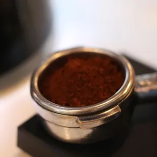 a cup of coffee on a saucer