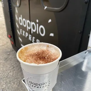 a cup of coffee on a table