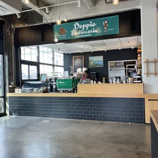 Front of stall, near R House entrance