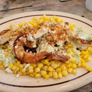 Adobe grilled shrimps on a bed of canned corns
