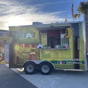 a food truck parked in front of a building