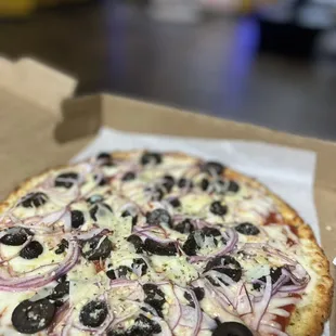 Special order pizza with olives