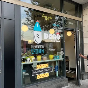 a woman entering a restaurant