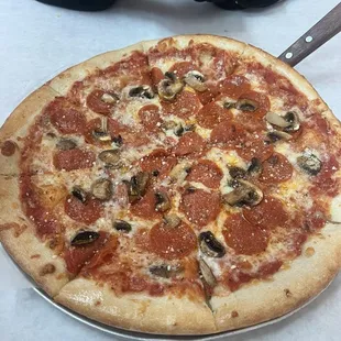 Pepperoni and mushroom pizza