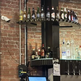 Gears built into the bar shelving.