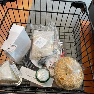 a shopping cart full of groceries