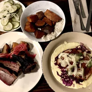 Brisket with golden beets, pork and polenta, truffle confit potatoes, side of pickles