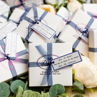 a close up of wedding favors