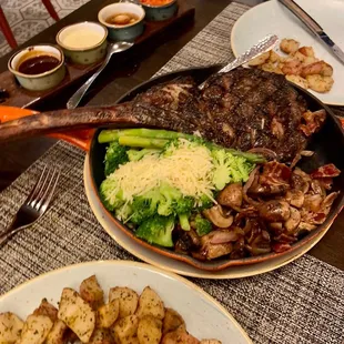 Tomahawk steak asparagus and roasted potatoes for sides. Sauces that come with the tomahawk.