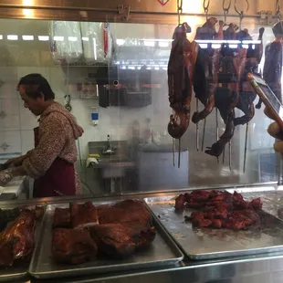 a woman preparing food in a kitchen