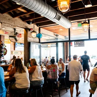Open-air dining, bar seating and large tables for groups!