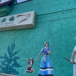 a mural of a man and a woman