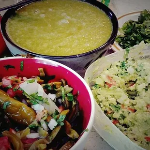 a bowl of soup and a bowl of salad