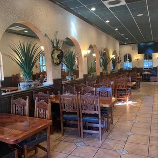 a restaurant with tables and chairs