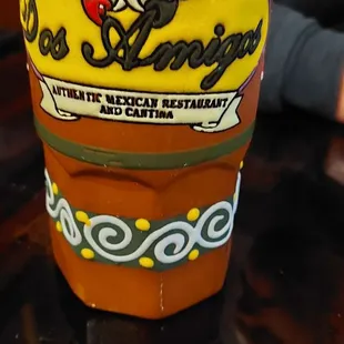 a glass of beer on a table