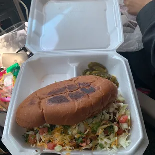 Torta of carnitas and pastor