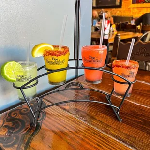 a row of drinks on a table