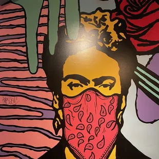 a man with a bandana on his face