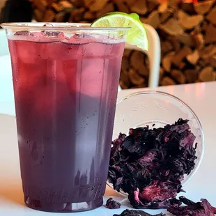 Refresh your day with our Hibiscus Iced Tea, a tangy splash of color in your glass! #JamaicaRefresh #DosBatosDrink