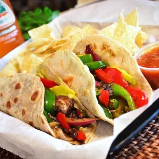 Meet &apos;The Ostin&apos;, our vibrant veggie taco with wood-fired flavor that sings of freshness! #TheOstin #VeggieDelight #DosBatos
