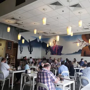 Dine under a striking mural with a wood-fired aroma at Dos Batos - a taste of Mexico awaits! #AuthenticMexican #DosBatos