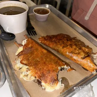 a tray of food and a cup of coffee