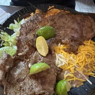 Carne Asada plate with rice and beans